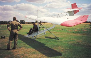 Grasshopper on its tripod