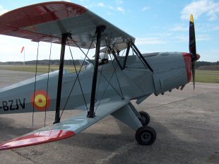 Alex sitting in the cockpit of one of the CASA 1-131 Jungmann biplanes Alex sitting in the cockpit of one of the CASA 1-131 Jungmann biplanes
