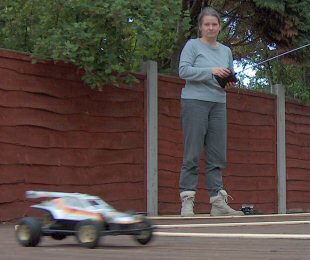 Carol driving radio-controlled model car